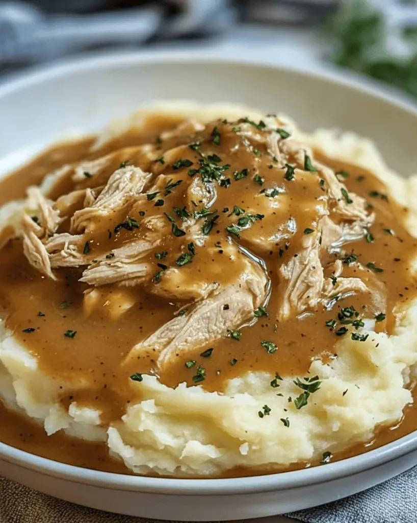 Shredded Chicken Gravy On Mashed Potatoes